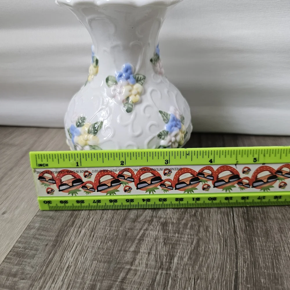 White Ceramic Vase with Pastel Floral Relief